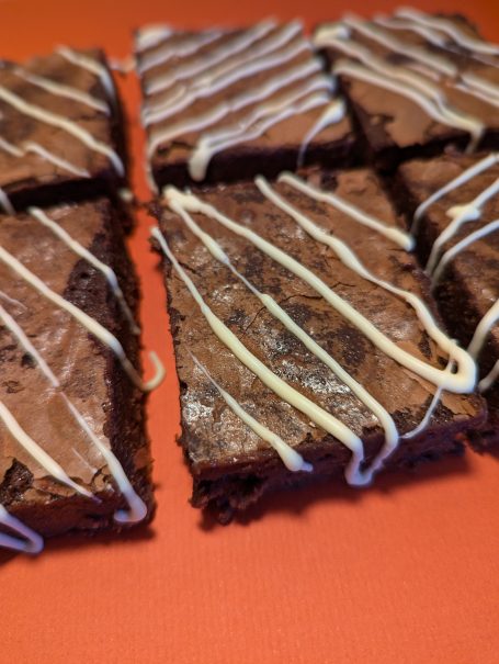 close up of 6 brownies decorated